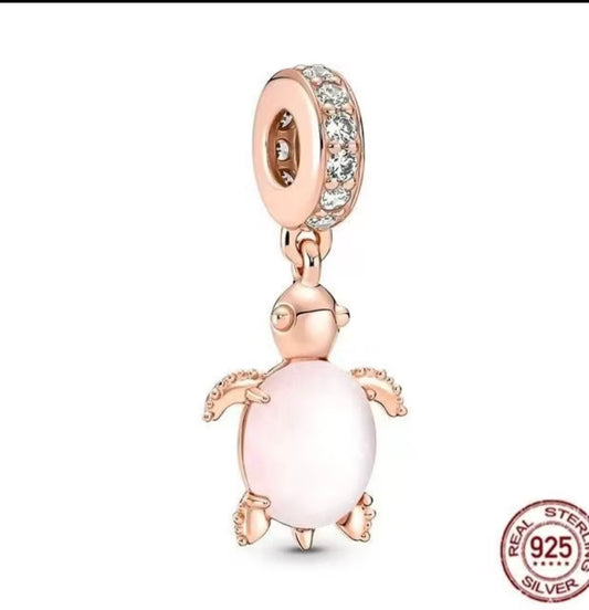 Dijen tortuga oro rosa